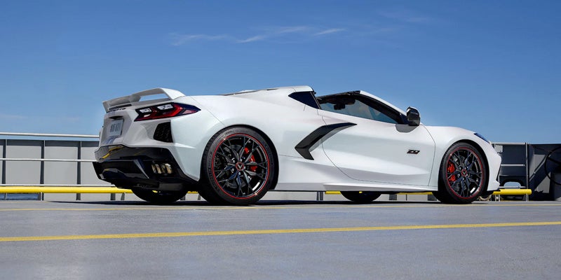 White Chevrolet Corvette parked on race track